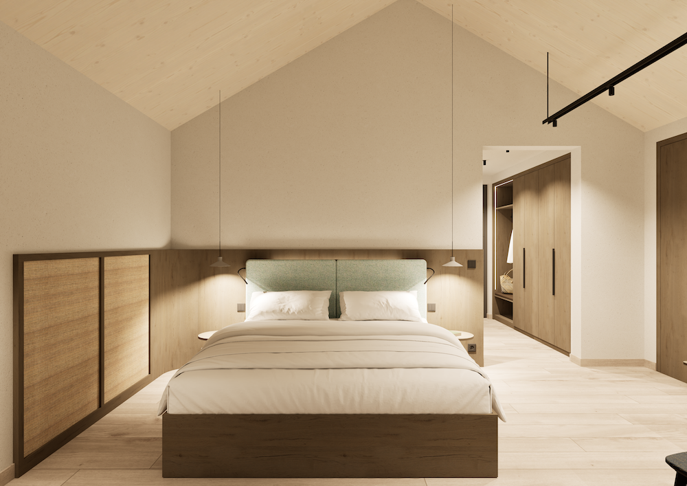 Ein modernes Zimmer mit einem Bettgestell aus Holz, weißer Bettwäsche, zwei Pendelleuchten, einem holzgetäfelten Kopfteil, einer schrägen Decke, hellen Holzböden und einer offenen Tür, die zu einem begehbaren Kleiderschrank führt - perfekt für alle, die den Winzerhäuser Stil lieben.